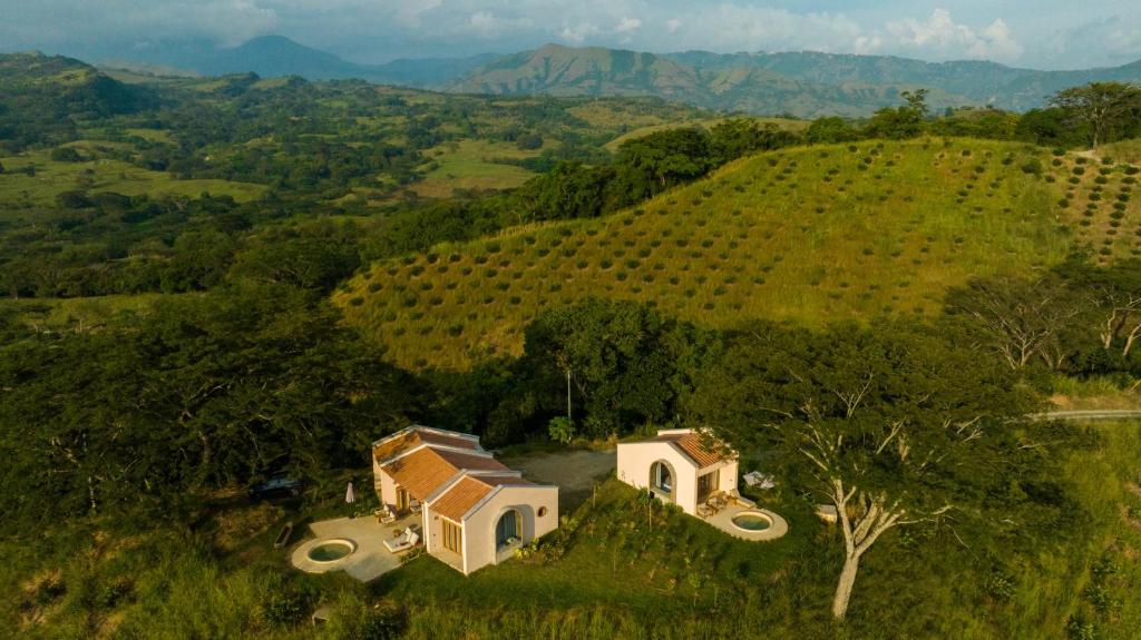 an aerial view of a house on a hill at Hotel Tahiti in Puente Iglesias