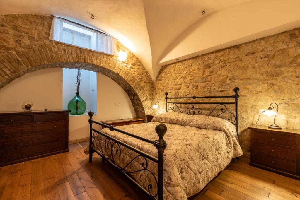 Krevet ili kreveti u jedinici u okviru objekta Lo Scrigno degli Angeli
