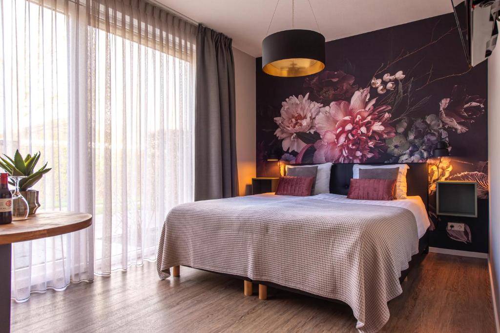 Postel nebo postele na pokoji v ubytování Villa Zoutelande