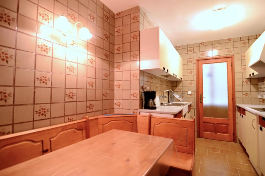 Kuchyňa alebo kuchynka v ubytovaní Puig Sureda - apartamentos