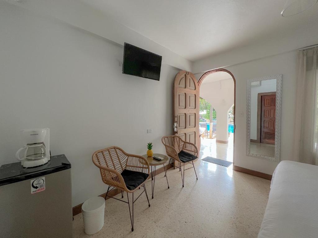 TV a/nebo společenská místnost v ubytování Hotel Mar Rey