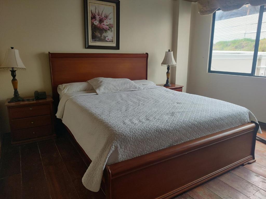 Posteľ alebo postele v izbe v ubytovaní Hotel Jardines del Rio