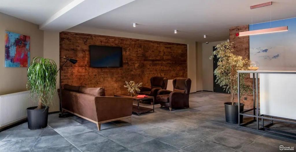 TV a/nebo společenská místnost v ubytování Atrium Apt. 403