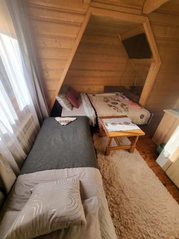Posteľ alebo postele v izbe v ubytovaní Domek Jelonek