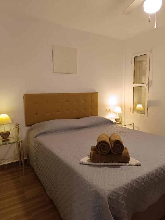 Postel nebo postele na pokoji v ubytování Vera Natura, Apartamento Alma