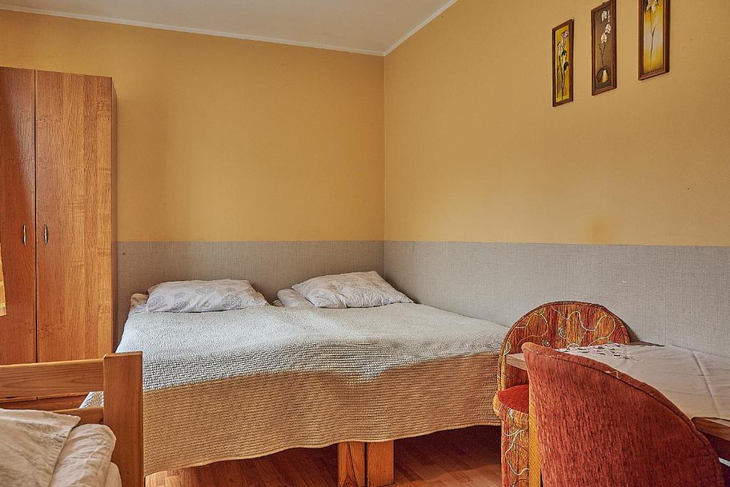 Posteľ alebo postele v izbe v ubytovaní Willa Potoki