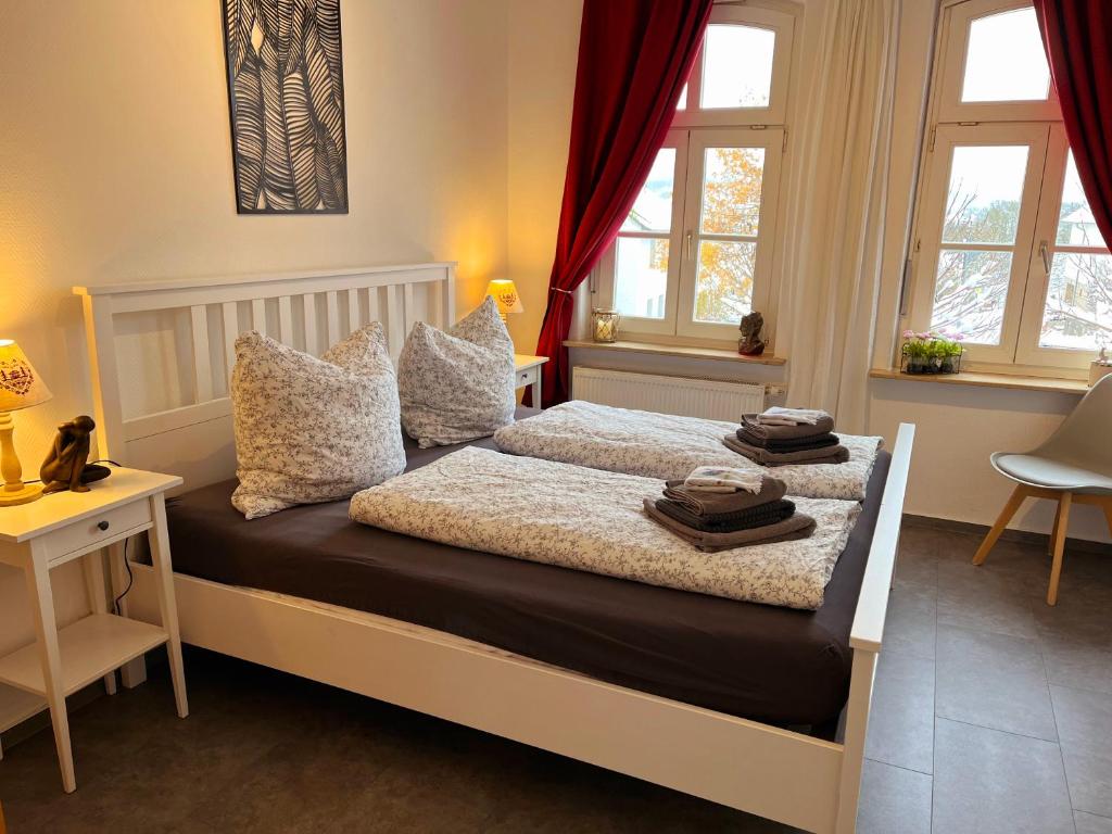 Posteľ alebo postele v izbe v ubytovaní Ferienwohnung Burghasungen