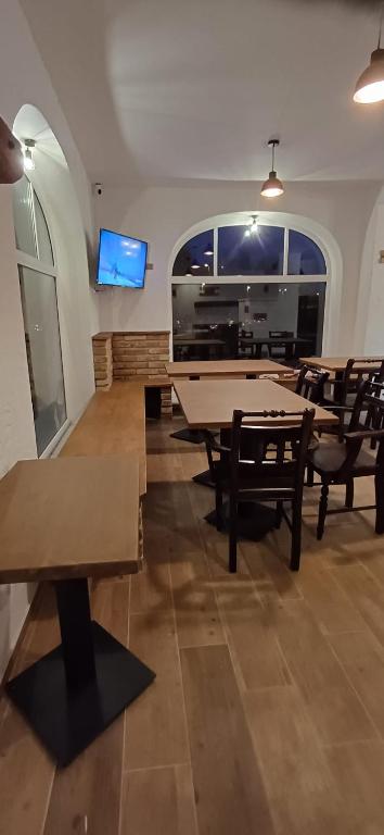 TV a/nebo společenská místnost v ubytování Pension Kobr