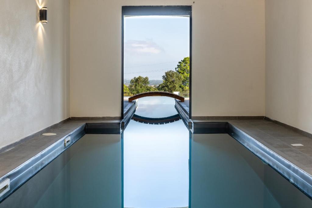 Bazén v ubytování Mas Sureda - Evasion luxueuse avec vue panoramique nebo v jeho okolí