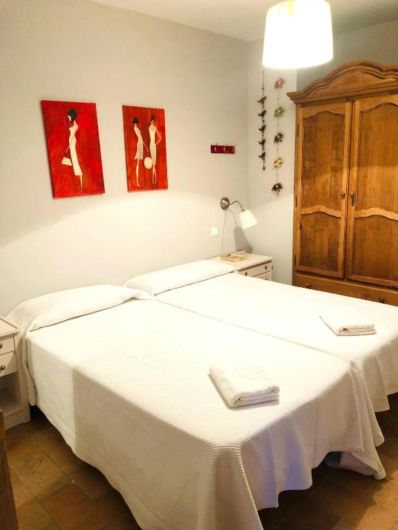 A bed or beds in a room at Nueva Cazorla Mirador Cerro del Escribano