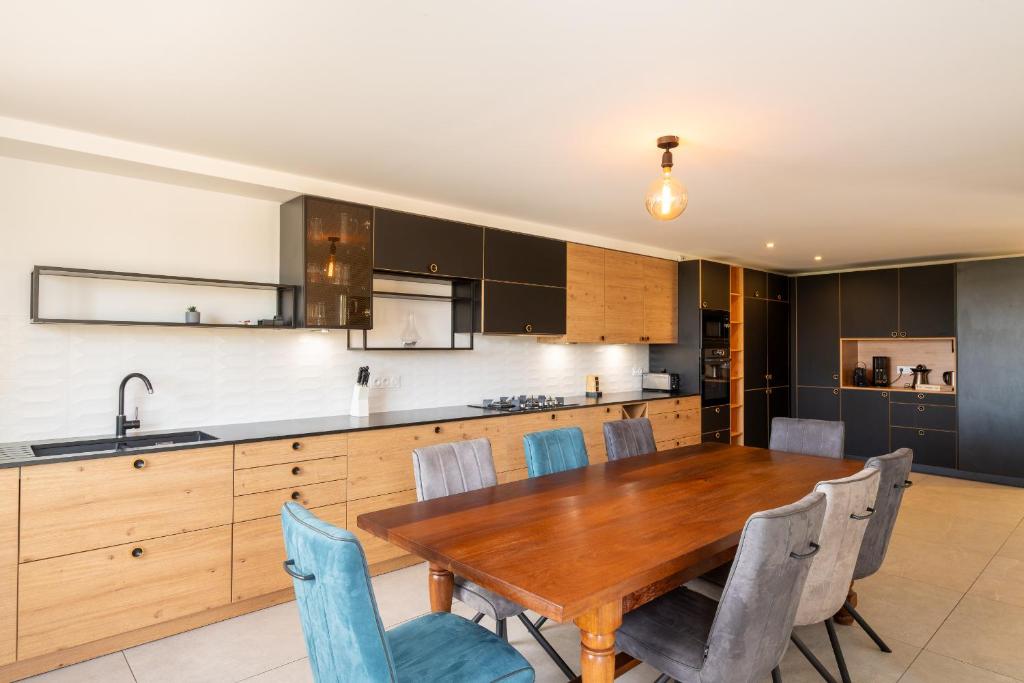 Kuchyň nebo kuchyňský kout v ubytování Mas Sureda - Evasion luxueuse avec vue panoramique