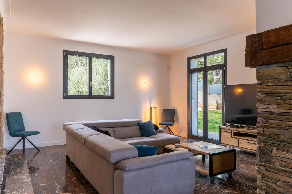 Posezení v ubytování Mas Sureda - Evasion luxueuse avec vue panoramique