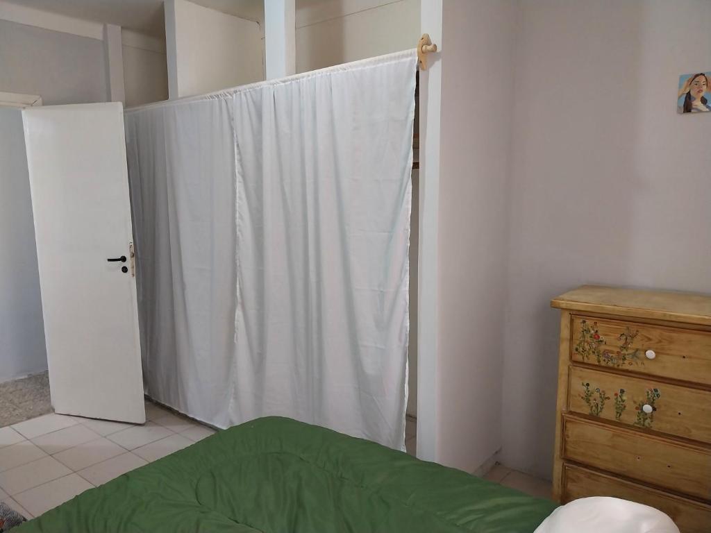 En eller flere senge i et værelse på Ph tipo casa Barrio Chauvin para 6 huespedes excelente ubicación