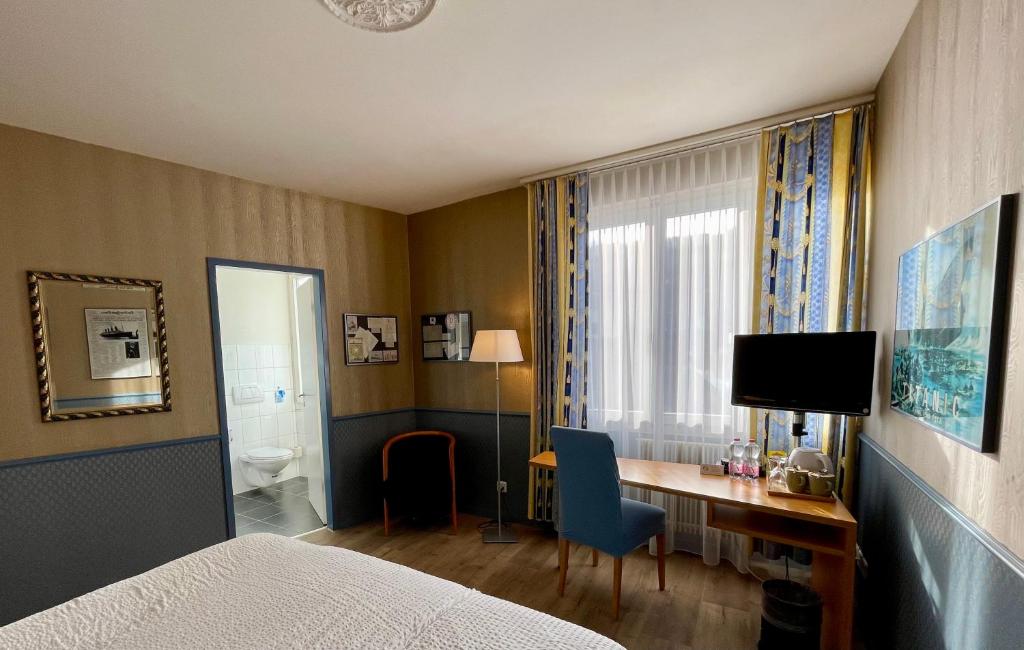 TV a/nebo společenská místnost v ubytování Hotel Movieworld