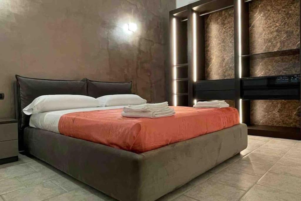 Ένα ή περισσότερα κρεβάτια σε δωμάτιο στο Casa vacanze SMA93