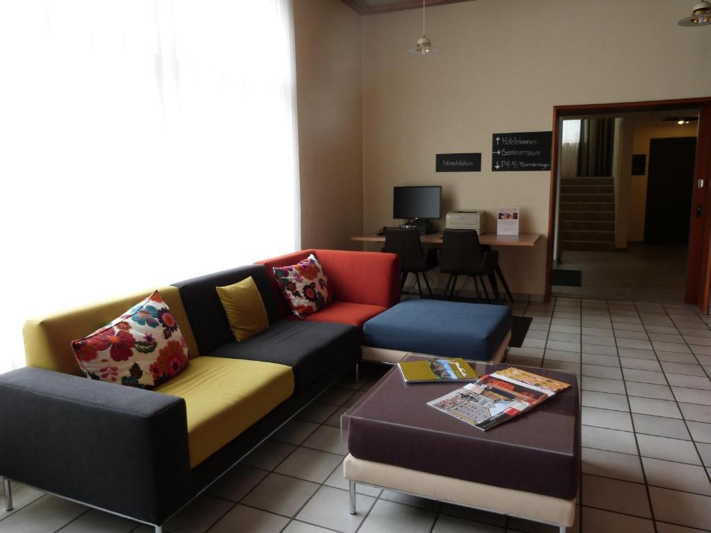 Posezení v ubytování Hotel Sportcenter Fünf Dörfer AG