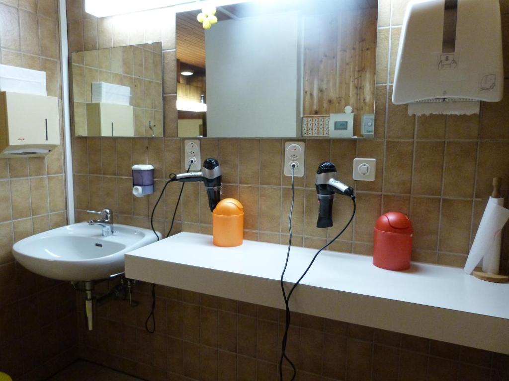 Koupelna v ubytování Hotel Sportcenter Fünf Dörfer AG