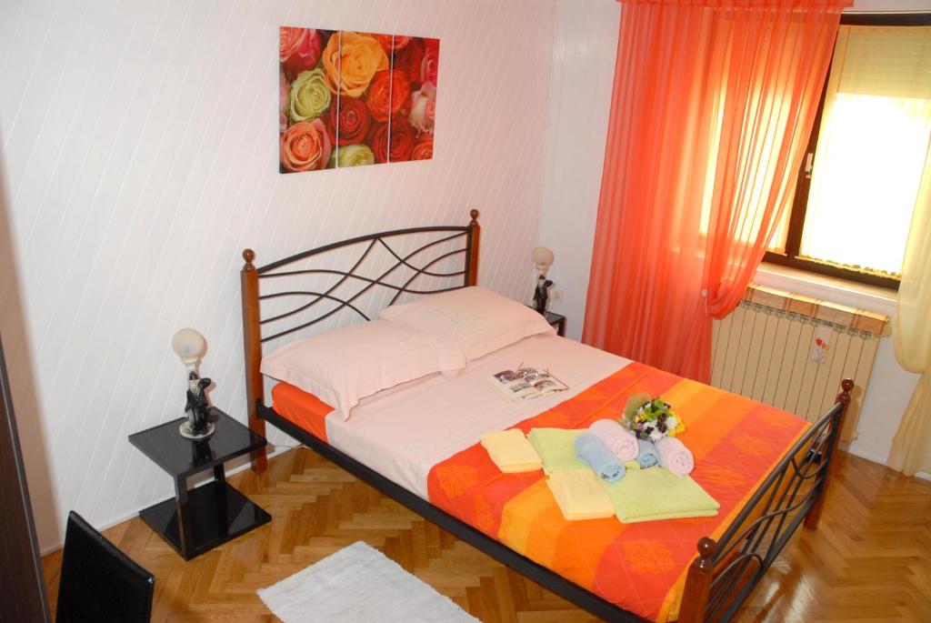 Łóżko lub łóżka w pokoju w obiekcie Holiday Home Villa Margherita