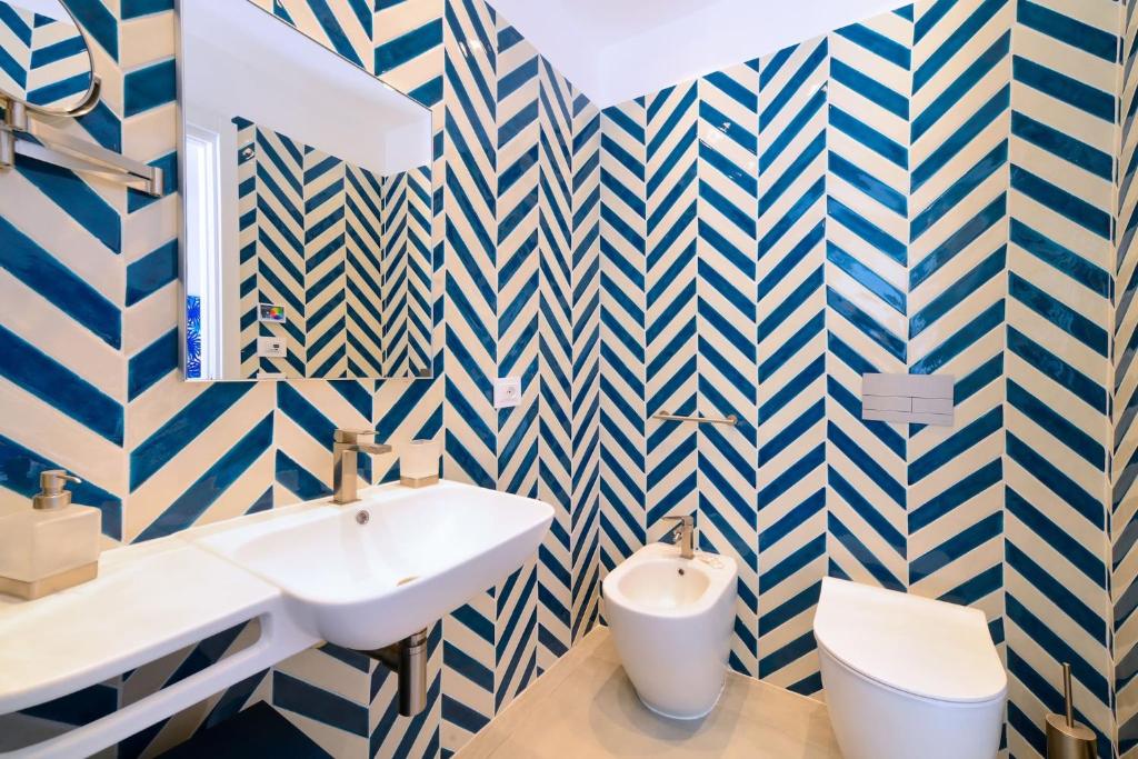 A bathroom at My Exclusive Italy - Beachfront Villa Sorrento & private sea access