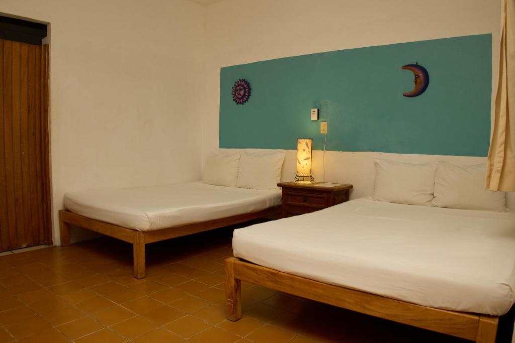 Postel nebo postele na pokoji v ubytování Hotel San Lorenzo