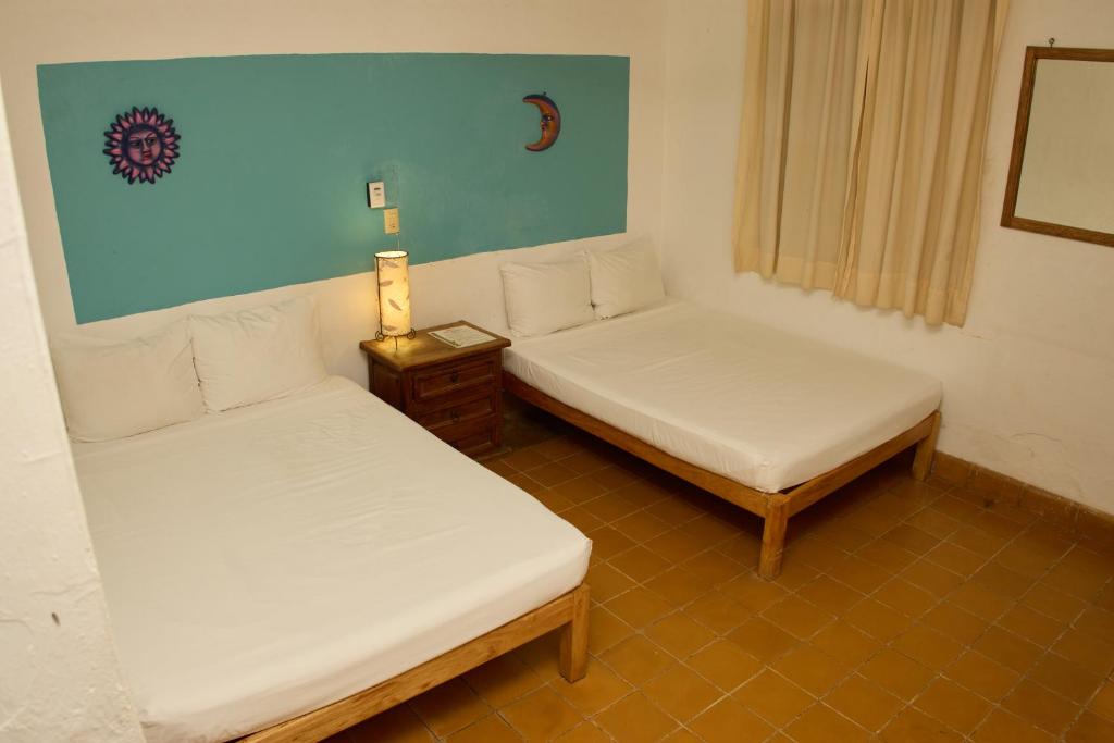 Postel nebo postele na pokoji v ubytování Hotel San Lorenzo