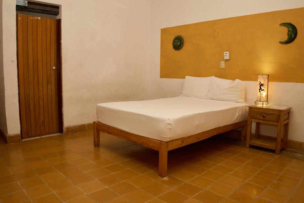 Postel nebo postele na pokoji v ubytování Hotel San Lorenzo