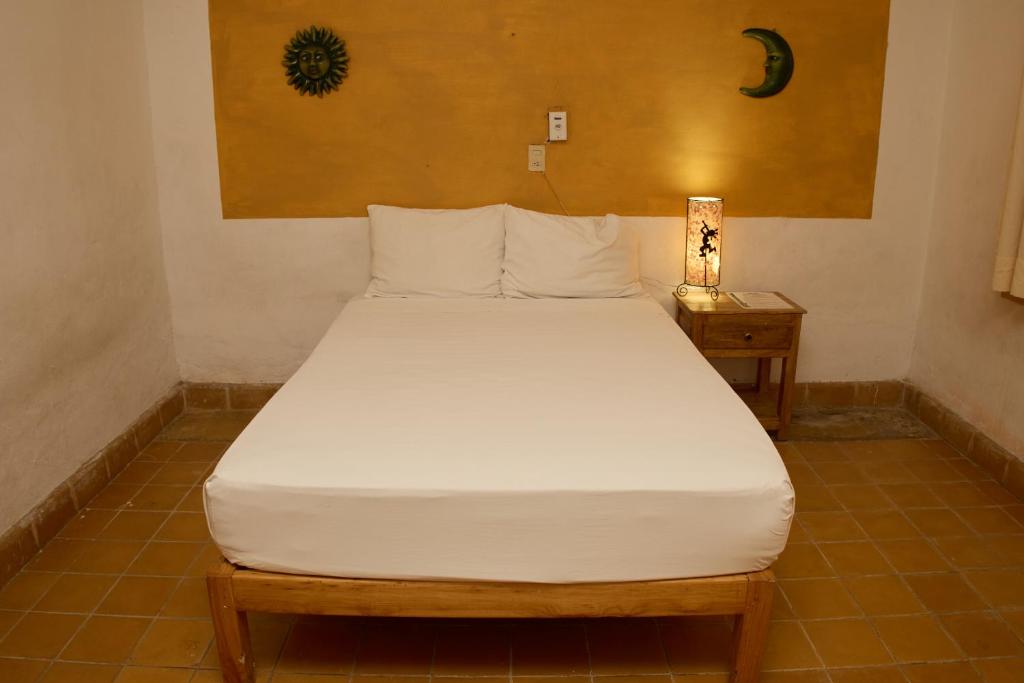 Postel nebo postele na pokoji v ubytování Hotel San Lorenzo
