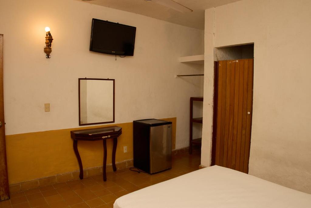 Postel nebo postele na pokoji v ubytování Hotel San Lorenzo