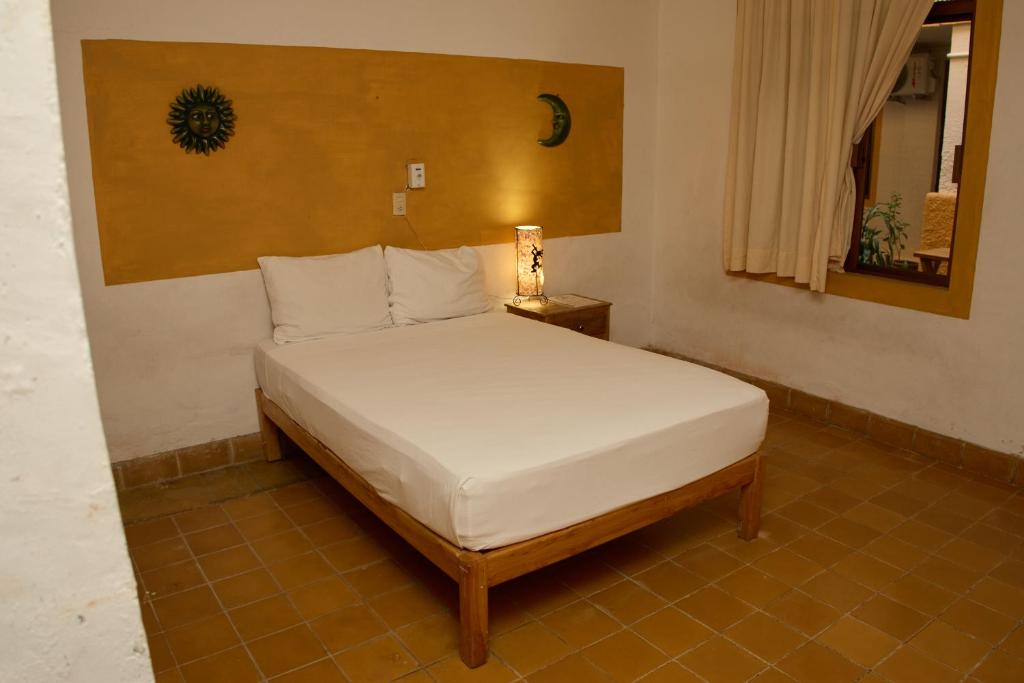 Postel nebo postele na pokoji v ubytování Hotel San Lorenzo