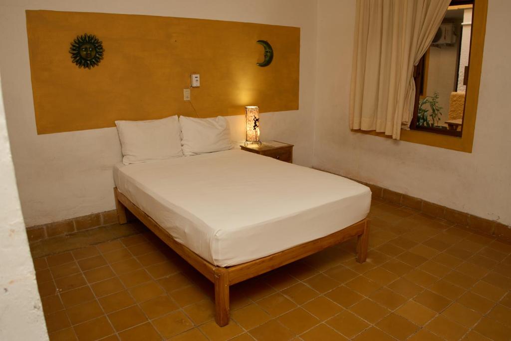Postel nebo postele na pokoji v ubytování Hotel San Lorenzo