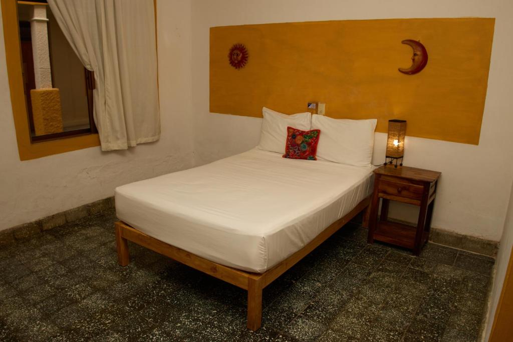 Postel nebo postele na pokoji v ubytování Hotel San Lorenzo
