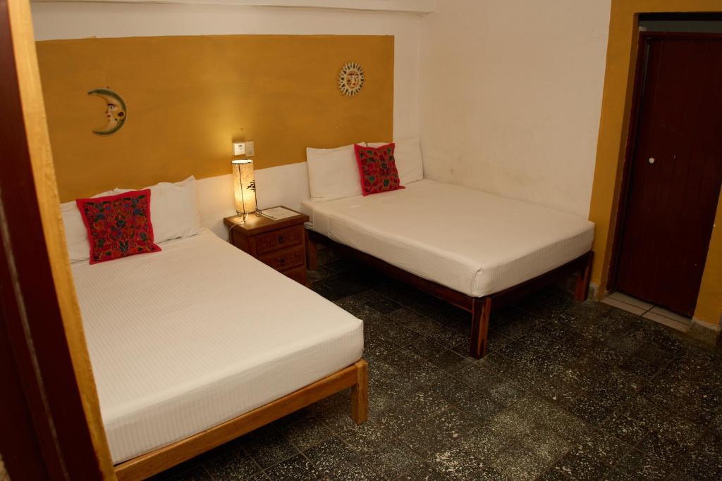 Postel nebo postele na pokoji v ubytování Hotel San Lorenzo