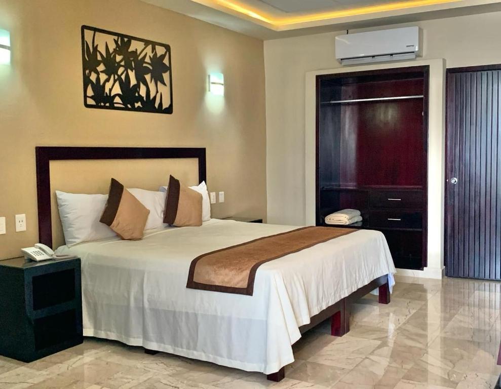 Letto o letti in una camera di Hotel Yorio Inn