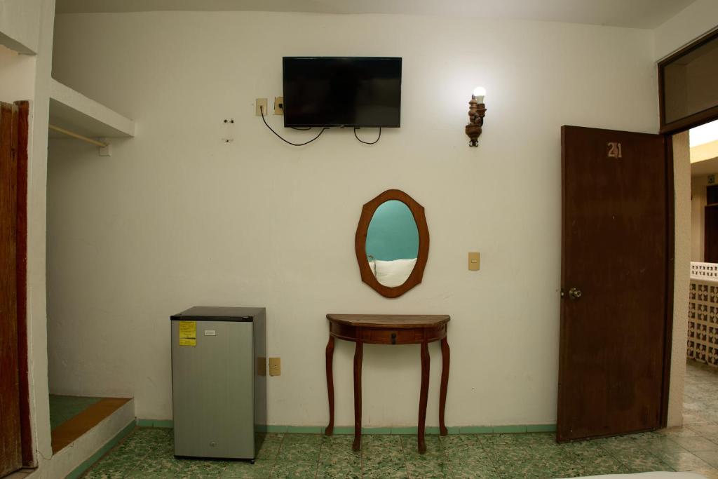 TV a/nebo společenská místnost v ubytování Hotel San Lorenzo