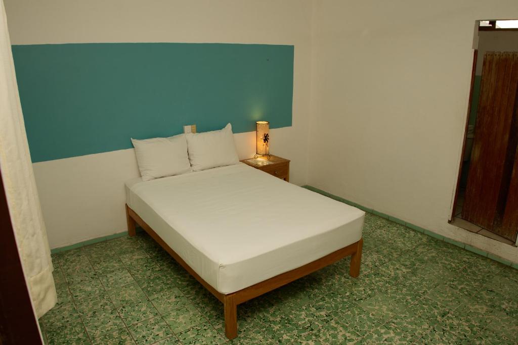 Postel nebo postele na pokoji v ubytování Hotel San Lorenzo