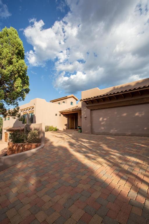 a driveway in front of a house at Spectacular Sedona Destination with Pool & Spa in Sedona