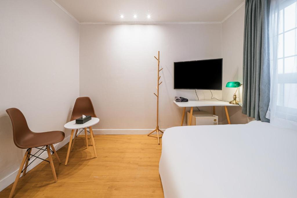 TV a/nebo společenská místnost v ubytování Lofy house
