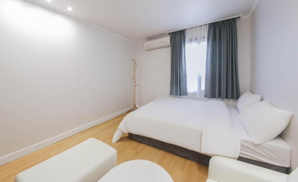 Postel nebo postele na pokoji v ubytování Lofy house