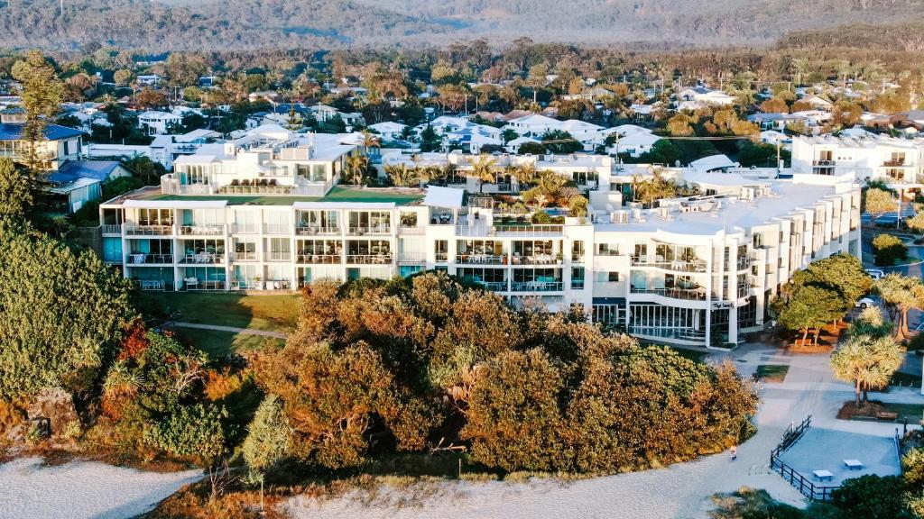 an aerial view of a large white building at The Beach Cabarita in Cabarita Beach