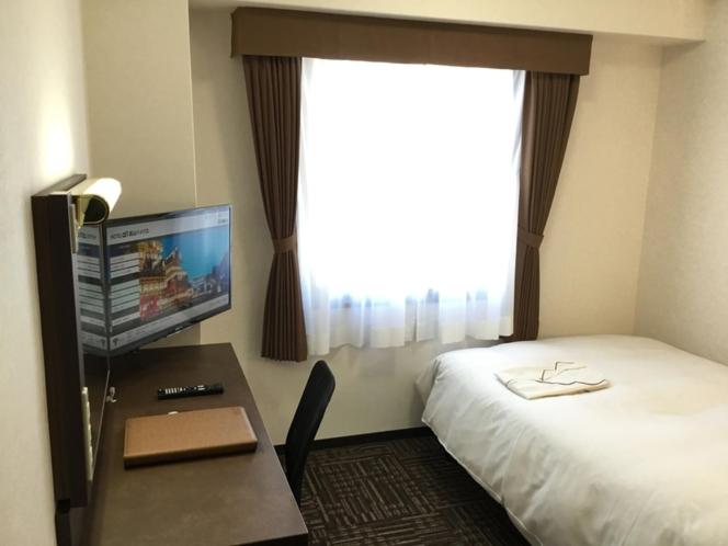 TV a/nebo společenská místnost v ubytování Hotel Alpha-One Takayama Bypass