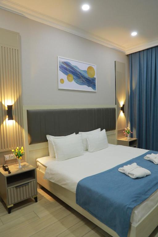 Postel nebo postele na pokoji v ubytování Human Hotel