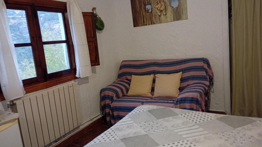 A seating area at "Casa Ibero" Bubion, Alojamiento Turistico Rural