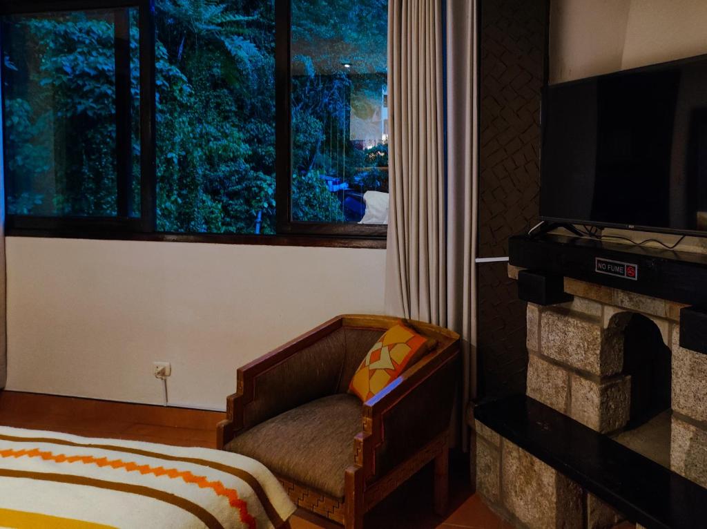 Postel nebo postele na pokoji v ubytování NaturaLodge Machu Picchu