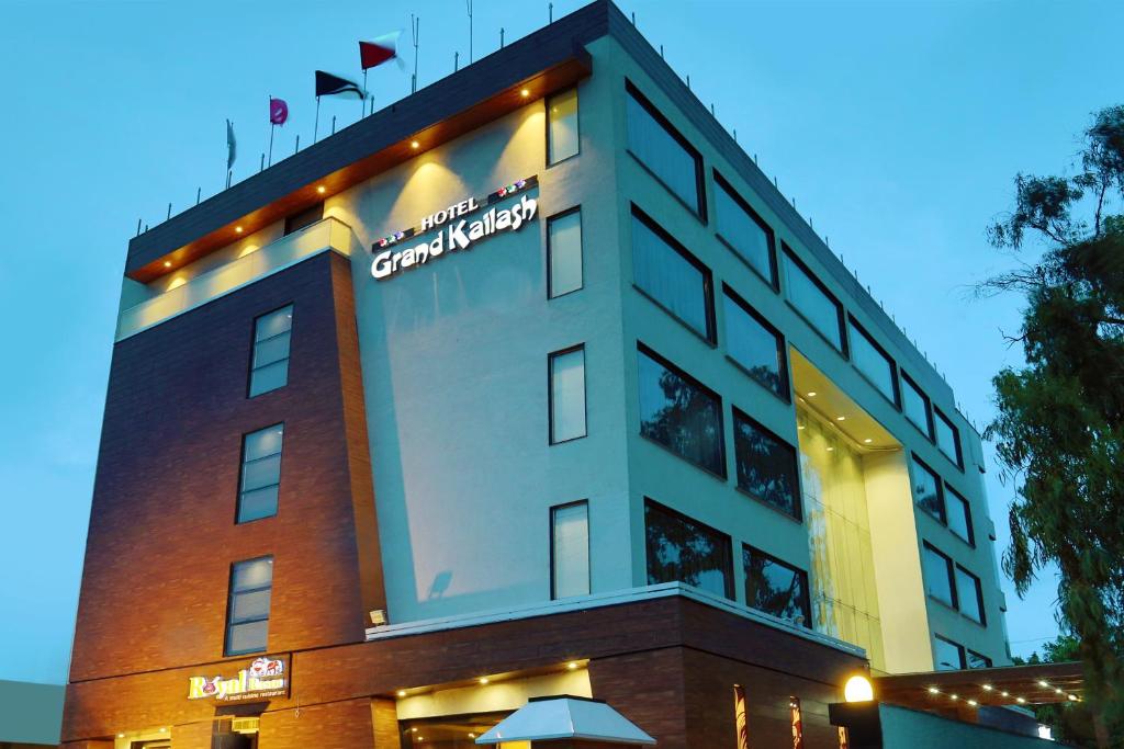 a building with a sign on top of it at Grand Kailash Hotel in Aurangabad