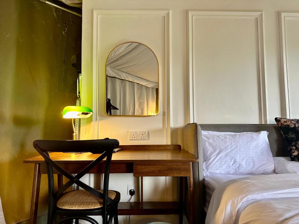 Letto o letti in una camera di kMah@SomerMansion