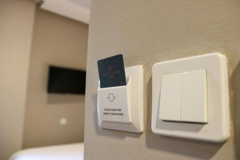 TV a/nebo společenská místnost v ubytování Grand Ametis Hotel Jakarta