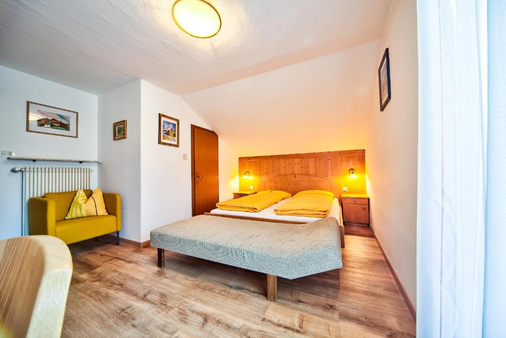 Postel nebo postele na pokoji v ubytování Gasthof Anny