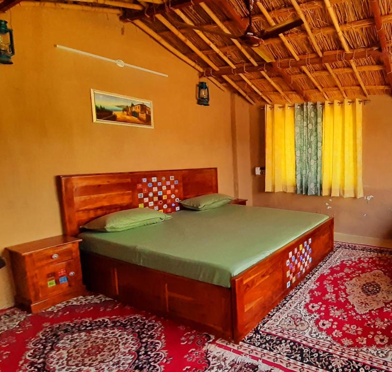 a bedroom with a large bed in a room at Vedic Life Homestay in Jaipur