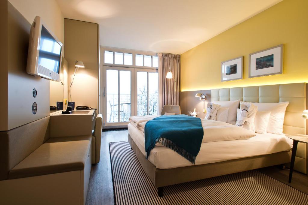 Postel nebo postele na pokoji v ubytování Hotel AM MEER & Spa