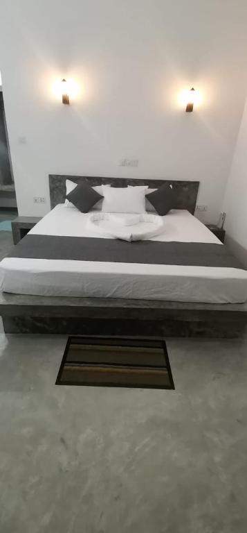 Postel nebo postele na pokoji v ubytování Sudu Guest